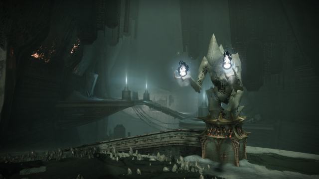 The HIve statue in a Court of Blades activity. It shows a prostrated Thrall with palms up, and each hand holds a flame.