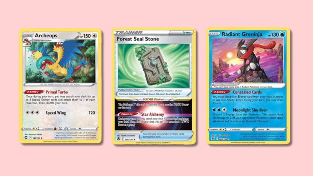 Archeops, Forest Seal Stone, and Radiant Greninja Pokémon cards on a plain pink background.