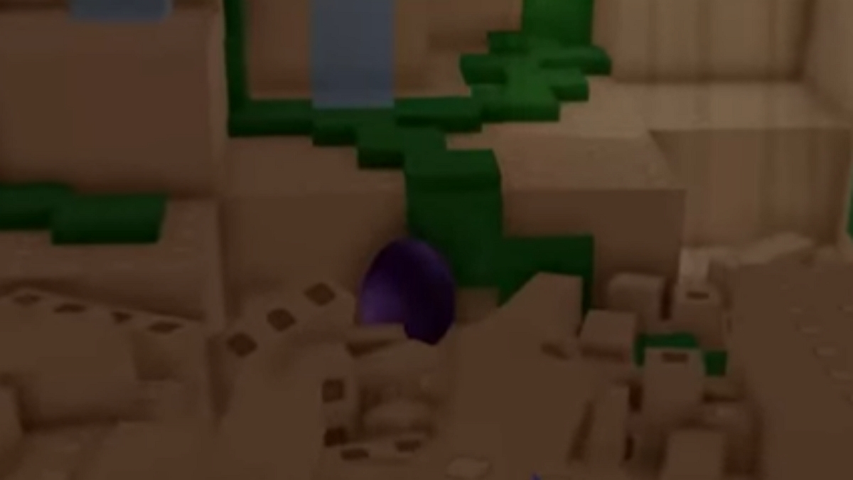 A dark orb appears in the rubble in a Roblox cave.