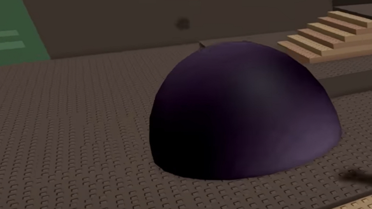 A dark orb appearing from the ground in Roblox.