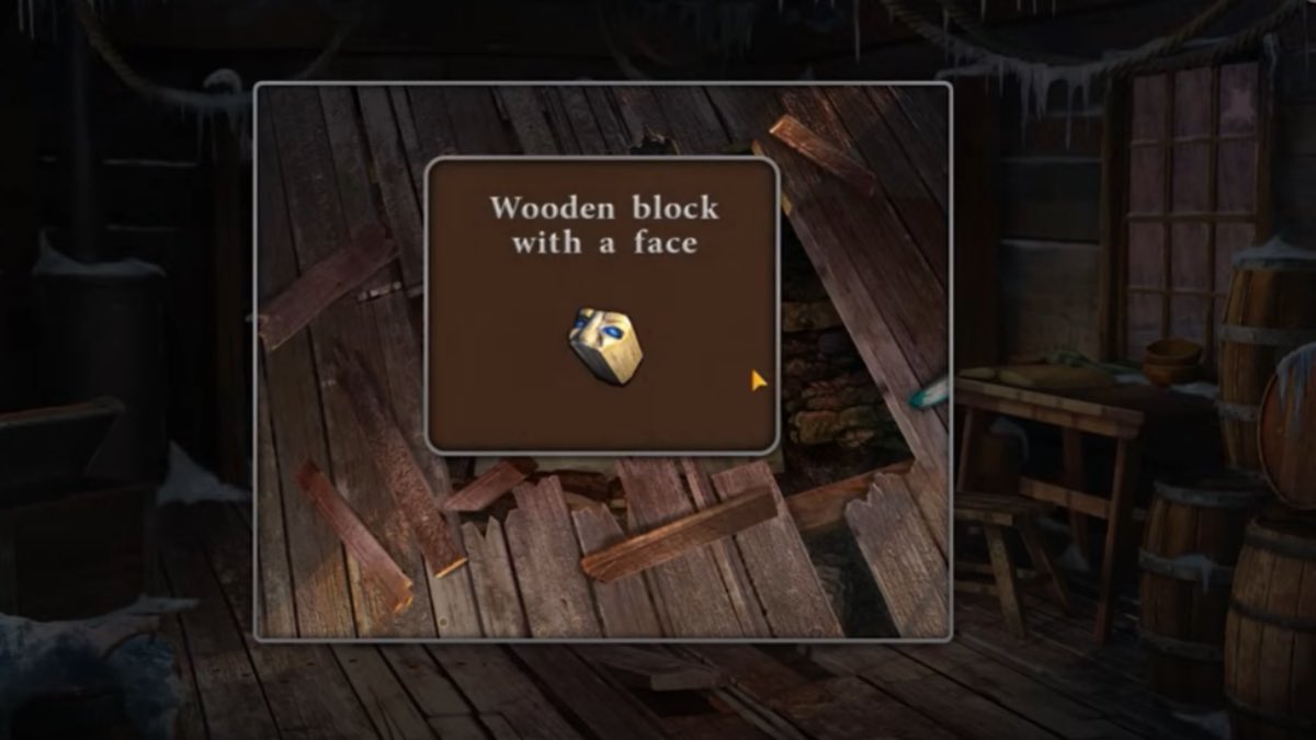 wooden block with a face