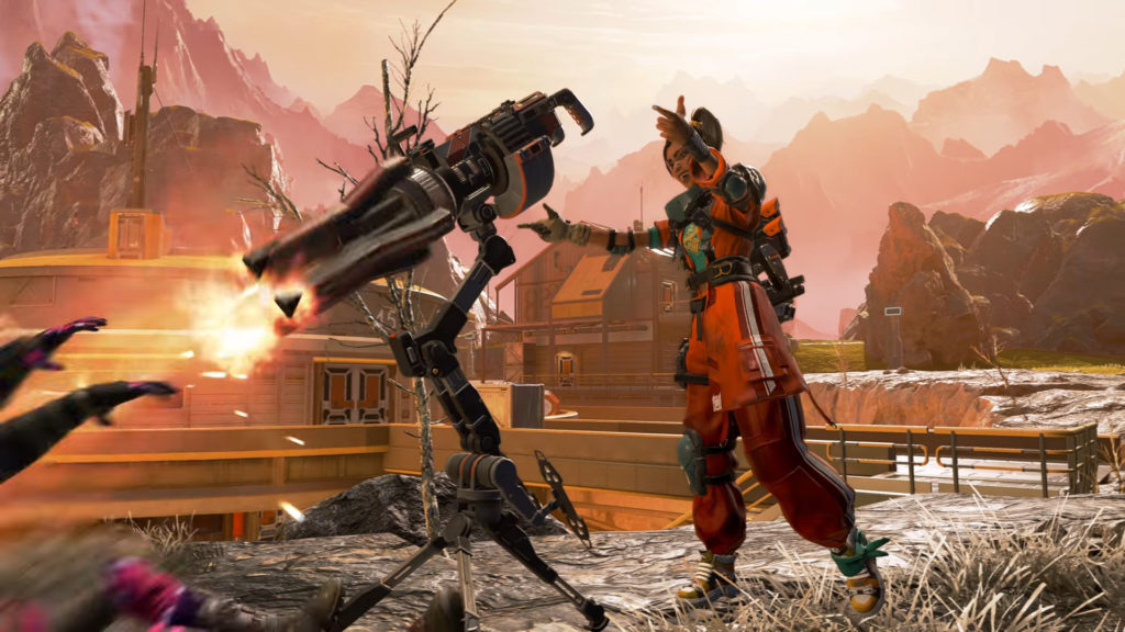Rampart celebrates and laughs as her minigun, Sheila, fires into an enemy.