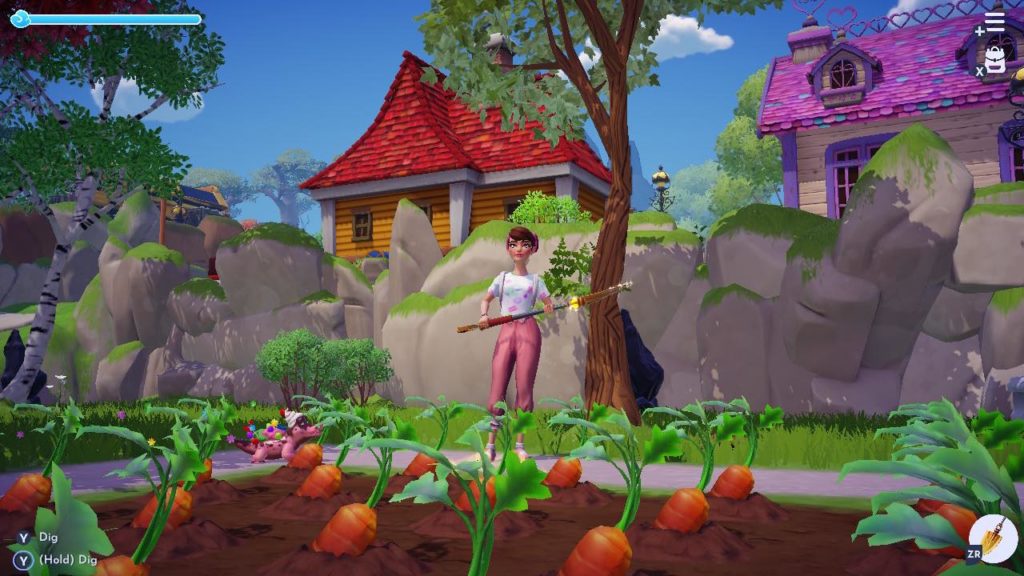 The player holding a shovel and standing near a garden of carrots.